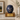 Ocean Spirit Metal Pet Ashes Urn on a memorial plinth with a brass plaque
