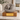 Dark Grey Porcelain Sleeping Cat Ashes Urn on a memorial plinth with a brass plaque