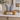 Grey Ceramic Butterfly-Shaped  Ashes Urn on a memorial plinth with a silver plaque
