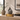Dark Grey & White Porcelain Teardrop Heart Ashes Urn (Celest) on a memorial plinth with a brass plaque