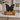 Black Ceramic Butterfly-Shaped Keepsake Ashes Urn on a memorial plinth with a brass plaque