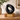 Black & Silver Ceramic Ashes Urn on a memorial plinth with a brass plaque