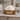 White Glossy Ceramic Sleeping Cat Pet Ashes Urn on a memorial plinth with a brass plaque