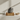 Dark Grey Porcelain Palm Pet Cat Ashes Urn on a memorial plinth with a brass plaque