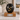 Eternal Black Metal Pet Ashes Urn on a memorial plinth with a silver plaque