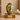 Premium Rainbow Hand Blown Glass Single Adult Ashes Urn on a memorial plinth with a brass plaque