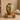 Premium Rainbow Hand Blown Glass Single Adult Ashes Urn on a memorial plinth with a silver plaque