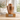 Superior Copper Leaf Single Ashes Urn on a memorial plinth with a silver plaque