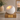 White Porcelain Adult Ashes Urn with Tea Light Holder - Lumos on a memorial plinth with a brass plaque