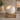 White Porcelain Adult Ashes Urn with Tea Light Holder - Lumos on a memorial plinth with a silver plaque